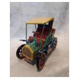 Modern toys old tin toy car