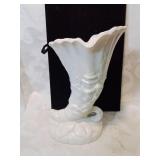 White horn of plenty vase , with asian d