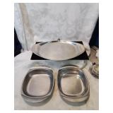 Set a three stainless serving dishes