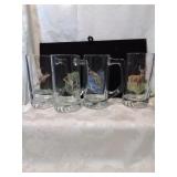 Set a four glass sports mugs