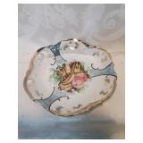 Hand paint a dish with fruit