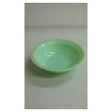 Vintage green glass bowl on stub feet