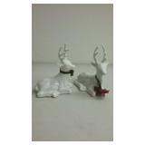 Pair of reclining deer in white porcelain