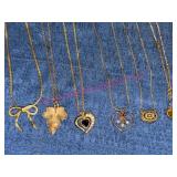 6 Avon Gold-Tone Necklaces w/Charms
