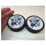 (LR)ï¿½2 Signed Indianapolis Ice Hockey Pucks