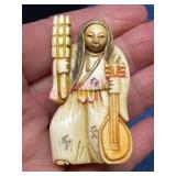 Hand-Carved Figurine w/Rotating Faces