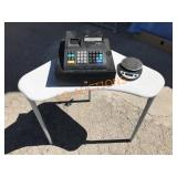 Cash Register, Scale and Table