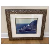 Lighthouse on Rocky Coast Picture