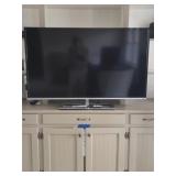 Toshiba TV Screen with Remote on Stand