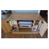 Cabinet with Apex RCA DVD Player and DVDs