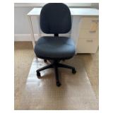 Office Chair and Floor Matt
