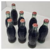 Eight Collectible Unopened Glass Coca-Cola Bottles