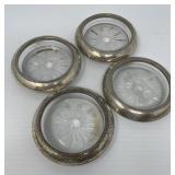 Four Sterling Rimmed Coasters
