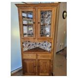 Oak Corner Cabinet with Wallpaper Background