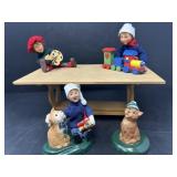 Table with Three Byerï¿½s Choice Boys and Cat