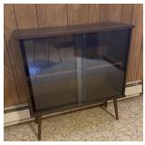 MCM BOOKCASE, DOUBLE GLASS SLIDING DOORS 1 SHELF