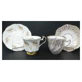 PORCELAIN TEA CUPS AND SAUCERS