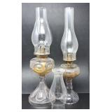 PAIR OF GLASS OIL-BURNING LAMPS