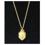 JOAN RIVERS EGG PENDANT ON CHAIN
