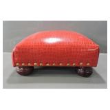 RED TEXTURED LEATHER-LOOK FOOTSTOOL, BUN FEET