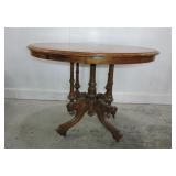 VICTORIAN STYLE OVAL CENTRE TABLE ON BRASS CASTORS