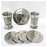 2 EMBOSSED PEWTER CUPS & 5 COASTERS