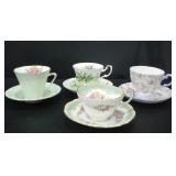 ASSORTED TEA CUPS AND SAUCERS