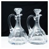 PAIR OF CRYSTAL PITCHERS W/ STOPPERS