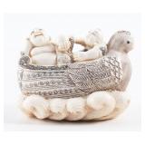 NETSUKE COMPOSITE MATERIAL BUDDHA IN ROOSTER BOAT