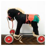 SCHUCO RIDE-ON HORSE TOY ON WHEELS