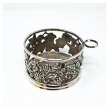 SILVERPLATE WINEBOTTLE HOLDER W/ GRAPEVINE PATTERN