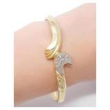 14KT GOLD & DIAMOND HINGED BANGLE 12.7g $4,950