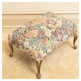 FLORAL PATTERN FOOTSTOOL WITH BRASS-TONE LEGS