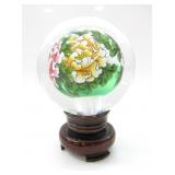 REVERSE-PAINT GLASS PAPERWEIGHT ON SPINNING STAND