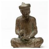 SCUPLTURE OF AN ASIAN SCULPTURE W/ BRONZE FINISH