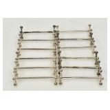 12 SILVER-PLATED CHRISTOFLE FORK & KNIFE HOLDERS
