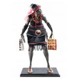 ERIC WILSON PAPIER MACHE WOMAN WITH SHOPPING BAGS