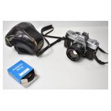 MINOLTA SRT201 35M FILM CAMERA AND ADAPTER RING