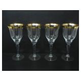FOUR GOLD RIMMED WATER GOBLETS