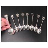 EIGHT SILVER SPOONS-CAMEL, ELEPHANT, FLOWER 71.5g