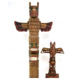 TWO REPRODUCTION TOTEM POLE FIGURINES