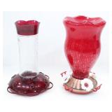 TWO RED BLOWN GLASS & PLASTIC HUMMINGBIRD FEEDERS