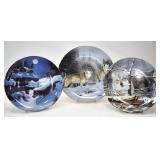 THREE DECORATIVE WOLF PLATES