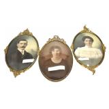THREE GILDED OVAL PICTURE FRAMES