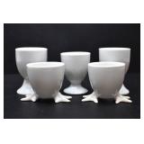 FIVE WHITE EGG CUPS