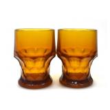 TWO AMBER GLASS CUPS