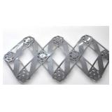 THREE PLACE METAL TRIVET