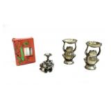 TRIO OF METAL FROG CANDLESTICKS W/ 9 CANDLES