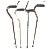 4 ASSORTED SIZED AND ADJUSTABLE WALKING CANES