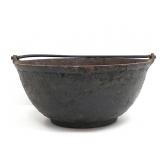 CAST IRON BOWL WITH HANDLE 4.5'X10'